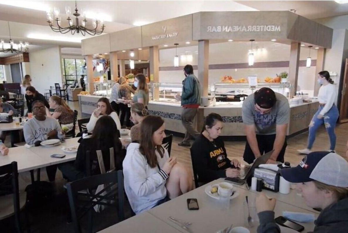 Students talk and eat in the Dining Hall